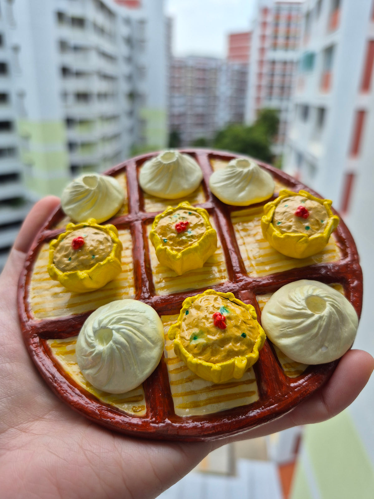 Magnetic dim sum tic-tac toe board